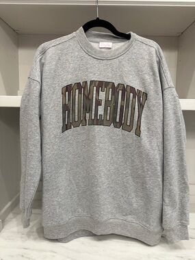 Pink Lily small gray sweatshirt.  Homebody logo  .  Like new